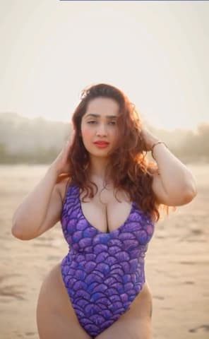 Aditi Mistry Showing Deep Cleavage & Big Ass in Red Monokini with Slight Nip Slip on Live ~ 5 Clips